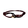 Image 1 : Cartier 18KT Rose and Black Gold Love Knot Silk Cord Bracelet