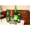 Image 1 : Diet-rite Cola Bottle, metal toy truck and various soda bottles
