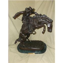 Marked "The Bronco Buster"- Frederic Remington Bronze- 17"W- 9"D X 24"H