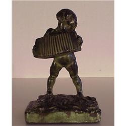 Edgardo Simone (1890-1948) American, THE ACCORDIAN PLAYER, sculpture, ceramic with copper overl...