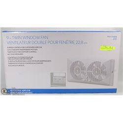 TWIN WINDOW FAN NEW IN BOX.