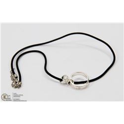 STERLING SILVER PENDANT ON BLACK CORD.