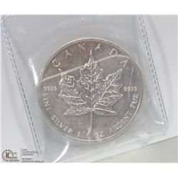 .999 SILVER ONE TROY OUNCE MAPLE LEAF COIN.