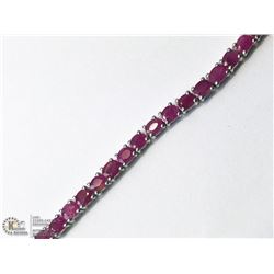 27) STERLING SILVER RUBY BRACELET