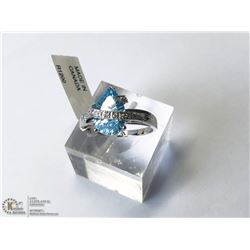 34) 14KT WHITE GOLD BLUE TOPAZ & CUBIC RING