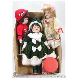 BOX OF 3 PORCELAIN DOLLS & JAR OF BEADS.