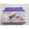 Image 1 : Singer Stitch Sew Quick handheld cordless mending machine