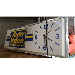AUTO VALUE LIGHT UP CLOCK ADVERT