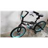Image 2 : BLACK AND BLUE HUFFY BIKE