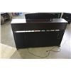 Image 8 : YAMAHA CLAVINOVA ELECTRIC PIANO AND SHEET MUSIC