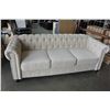 Image 1 : NEW ASHLEY BEIGE TUFTED AND STUDDED MODERN FABRIC SOFA, RETAIL $1699