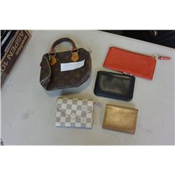 LV CARRY BAG AND 4 WALLETS