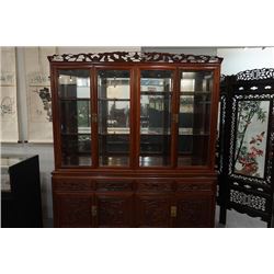 A Large Rosewood Cabinet. Condition as is, shown in photos.