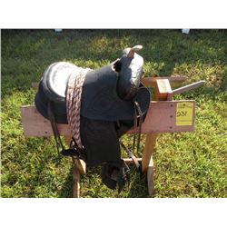 Saddle w/brass horn -comes w/stand, from estate