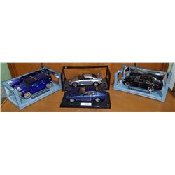 FOUR DIE CAST CARS