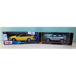 2 NIB DIE CAST CARS