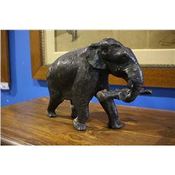 BRASS ELEPHANT CARRYING LOG