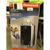 Image 1 : HONEYWELL 140,000 BTU PORTABLE AIR CONDITIONER WITH DEHUM & FAN