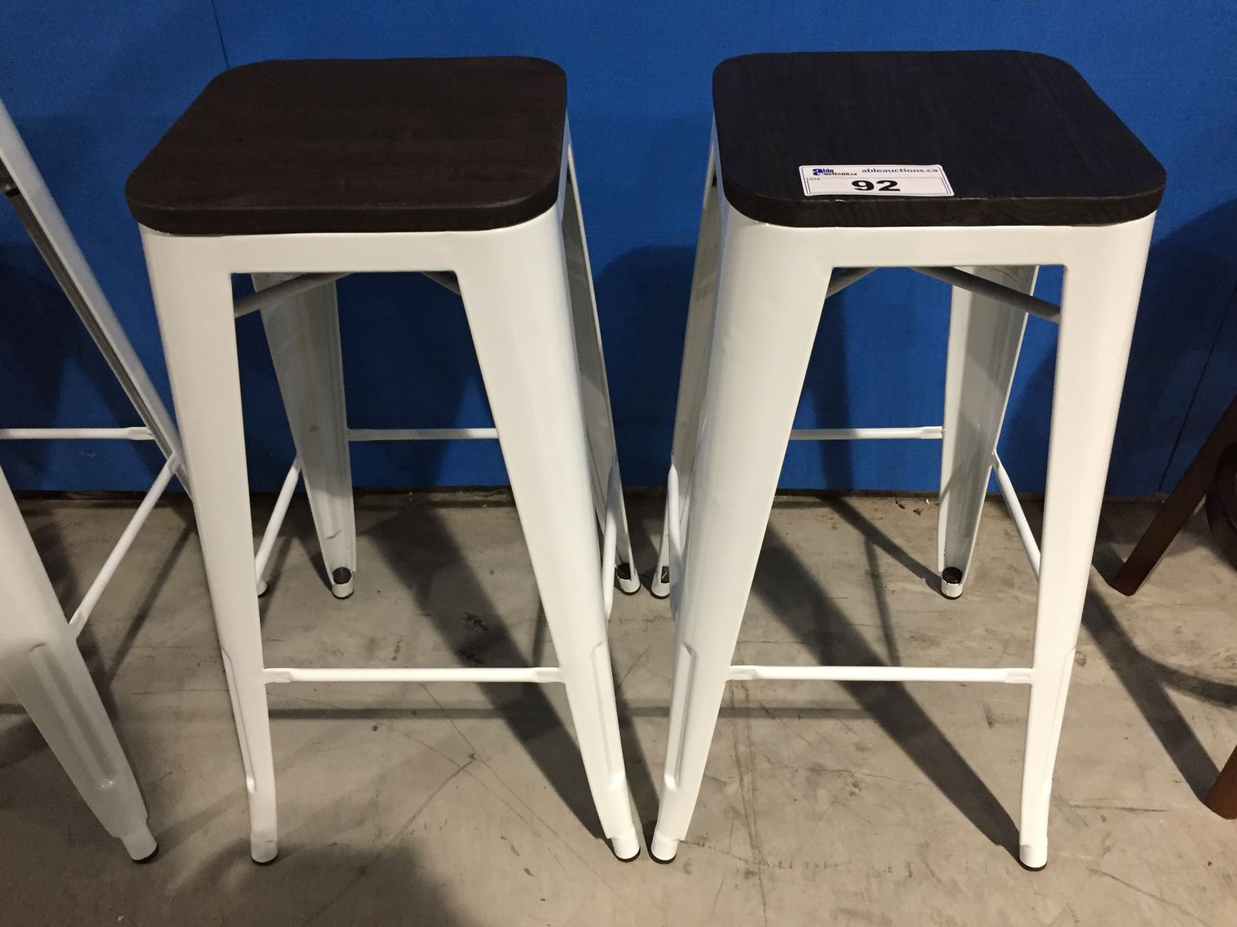 PAIR 30" WHITE METAL BAR STOOLS WITH WOOD SEAT - Able Auctions