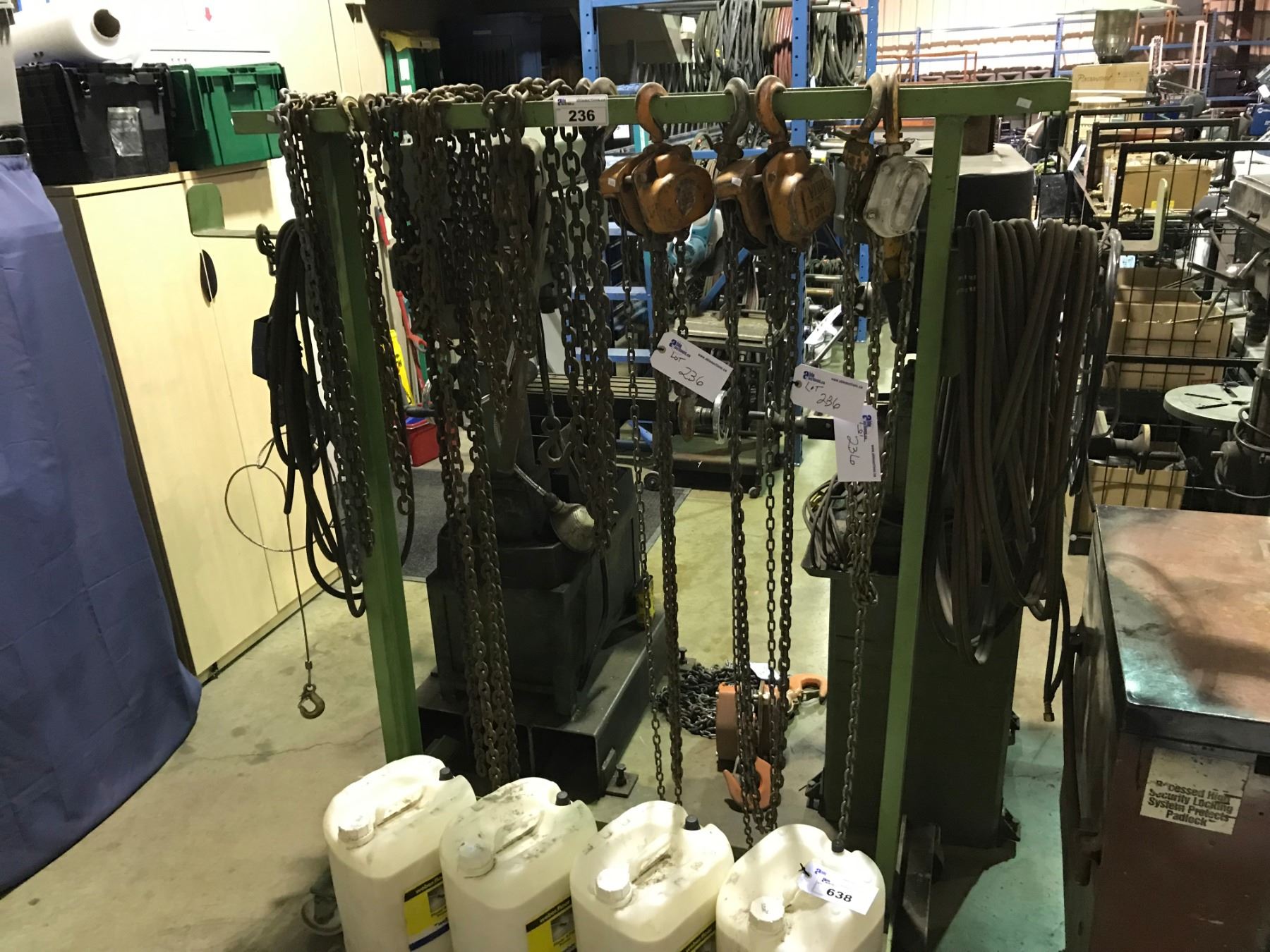 RACK AND ASSORTED CHAINS AND SHOP HOISTS
