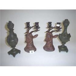 Pair of cold painted bronze stag head candle holders, 8" high plus pair of plaster garnitures, 10" h