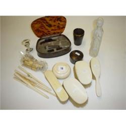 Box containing quantity of ivory and toitorshell items including brushes and manicure set