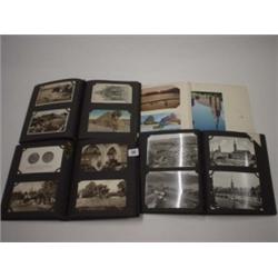 Four albums containing various postcards of topical UK and European dating from 1930s