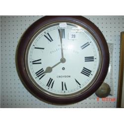 Clock: 19th century mahogany wall clock with bevelled glass face, enamel dial, M.R.C Cillett Bland &