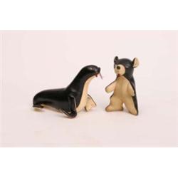 Two Guinness leather advertising toys