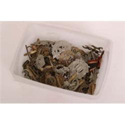 Over seventy military cap and other badges, from all over the country