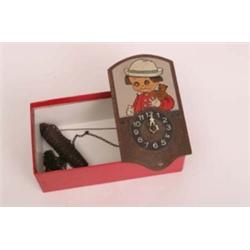 Small pine painted wall clock with dolls face and moveable eyes