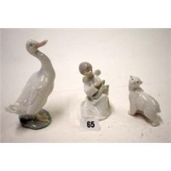 Three Lladro models, an angel, a duck and cat