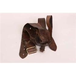 Two old Sam Browns, one made of snakeskin