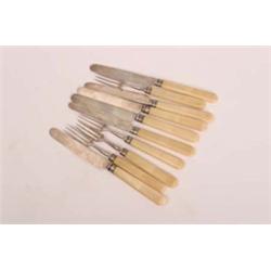 Silver hallmarked, Sheffield 1886, seven dessert knives  and three dessert forks with shaped bone ha