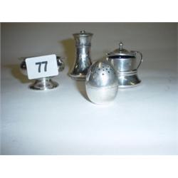 Birmingham silver mustard 1931 plus three various silver peppers and salt