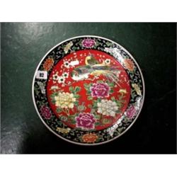 Large oriental saucer dish depicting birds of paradise and flowers
