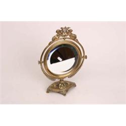 Late 19th century heavy brass table mirror with Staffordshire date triangle to base, decorated with 