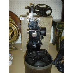 Old cinematic camera 'Pathescope' in need of restoration (1 reel missing) plus tin containing spools