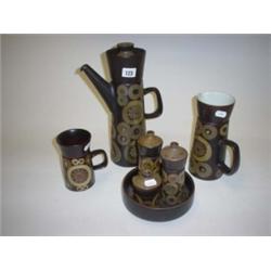 Denby pottery items, coffee pot, jug, cruet and two other items