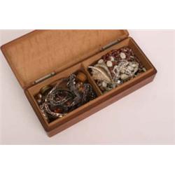 Box of decorative vintage costume jewellery, brooches, beads etc.