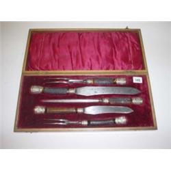 Victorian five piece cased horned handled carving set, Cheak & Co. set in red material