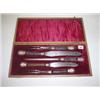Image 1 : Victorian five piece cased horned handled carving set, Cheak & Co. set in red material