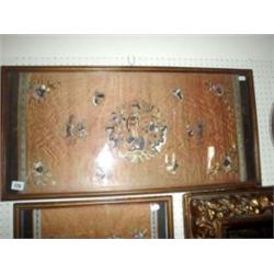 Glazed and framed antique oriental embroidered silk panel with central figure and insects, 31x16"