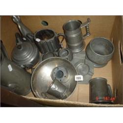Box of mixed pewter items to include tankards, teapot, bowls etc.