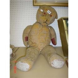 Large straw filled teddy bear, glass eyes and stitched nose, play worn, 30" high