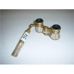 Mother of pearl and gilt opera glasses with telescopic handle marked 'Iris' Paris