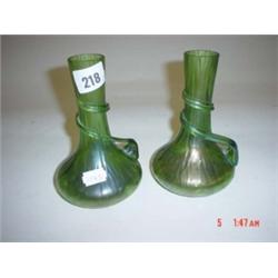 Pair of irredesent green Vaseline glass vases with twisted overlay (one with minor chip) 6.5" high