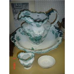 Late 19th century toilet water set comprising of jug and bowl with two other matching items