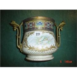 Porcelain brass mounted jardiniere with decorative panels and enamelled frieze around rim