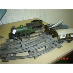 Bing O gauge G.W.R clockwork train, tender, two Pulman coaches, guards van and quantity of rails, pl